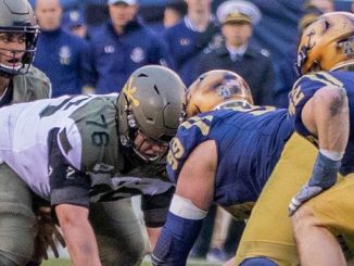 Army and Navy football players